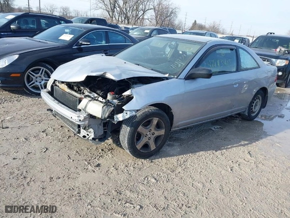 2005 Honda Civic LX with VIN 1HGEM215X5L064781, listed as a IAAI auction lot 41443405 with 303,293 mi miles. Bid and sale history available at carsss.com. Image 2.