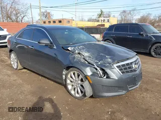 2014 Cadillac ATS Luxury AWD z VIN 1G6AH5RX6E0140302, wystawiony jako IAAI lot #41843454 z przebiegiem 125 388 mil mil oraz . Historia ofert i sprzedaży dostępna na DreamBid. Obrazek 1.