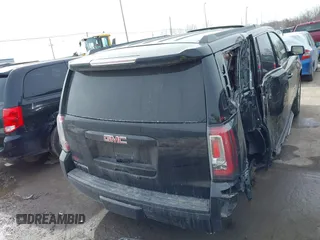 2016 GMC Yukon SLE with VIN 1GKS2AKC3GR398556, listed as a IAAI auction lot 41585972 with 130,961 mi miles. Bid and sale history available at carsss.com. Image 17.