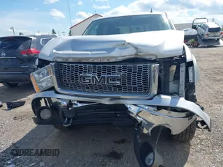 2012 GMC Sierra 1500 SLE z VIN 3GTP2VE71CG159590, wystawiony jako IAAI lot #42291489 z przebiegiem 167 528 mil mil oraz . Historia ofert i sprzedaży dostępna na DreamBid. Obrazek 6.