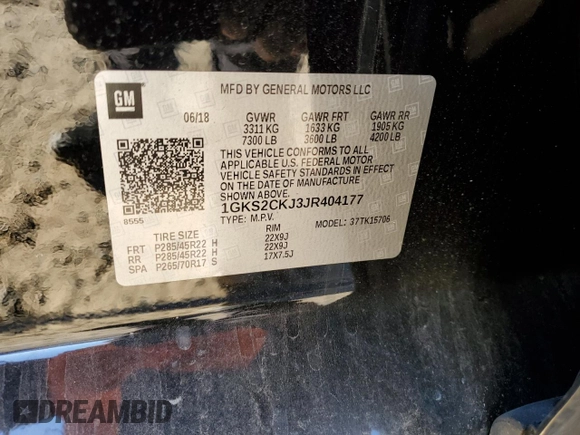2018 GMC Yukon Denali with VIN 1GKS2CKJ3JR404177, listed as a Copart auction lot 82577354 with 129,744 mi miles and Salvage Title. Bid and sale history available at carsss.com. Image 13.