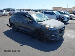 2019 Hyundai Tucson Sport z VIN KM8J33AL5KU925161, wystawiony jako IAAI lot #41570199 z przebiegiem 85 081 mil mil oraz . Historia ofert i sprzedaży dostępna na DreamBid. Obrazek 1.