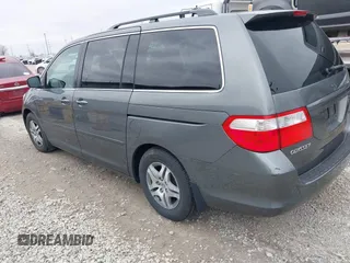 2007 Honda Odyssey EX-L with VIN 5FNRL38627B413638, listed as a IAAI auction lot 41960963 with 172,968 mi miles and . Bid and sale history available at DreamBid. Image 3.
