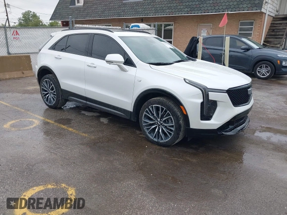 2024 Cadillac XT4 AWD Sport with VIN 1GYFZFR40RF223782, listed as a IAAI auction lot 42295745 with 7,254 mi miles and . Bid and sale history available at DreamBid. Image 1.