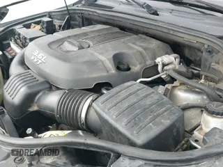 2012 Jeep Grand Cherokee Laredo с VIN 1C4RJFAGXCC118823, выставлен на аукционе IAAI как лот 41808398 с пробегом 153 509 миль миль и . История ставок и продаж доступна на DreamBid. Изображение 19.