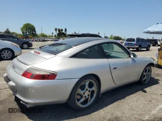 2003 Porsche 911 with VIN WP0BA29923S635457, listed as a Copart auction lot 61446545 with 85,602 mi miles and Salvage title. Bid and sale history available at DreamBid. Image 3.