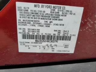 2019 Ford EcoSport SE z VIN MAJ3S2GE4KC302791, wystawiony jako Copart lot #53673525 z przebiegiem 54 600 mil mil oraz Czysty tytuł • Clean title. Historia ofert i sprzedaży dostępna na DreamBid. Obrazek 13.