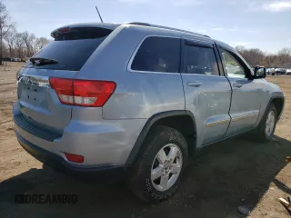 2012 Jeep Grand Cherokee Laredo with VIN 1C4RJFAG5CC222569, listed as a Copart auction lot 53264185 with 153,921 mi miles and Salvage Title. Bid and sale history available at carsss.com. Image 3.