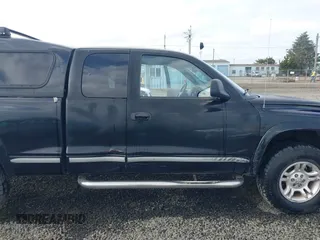 2004 Dodge Dakota SLT with VIN 1D7HG42N94S618531, listed as a IAAI auction lot 41741467 with 202,422 mi miles. Bid and sale history available at carsss.com. Image 6.
