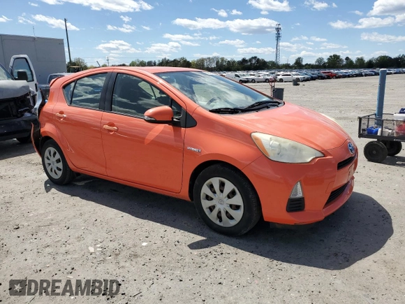 2012 Toyota Prius c One with VIN JTDKDTB35C1030051, listed as a Copart auction lot 52895065 with 94,529 mi miles and Salvage Title. Bid and sale history available at carsss.com. Image 4.