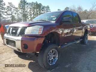 2007 Nissan Titan XE with VIN 1N6BA07A37N246586, listed as a IAAI auction lot 41393187 with 303,317 mi miles. Bid and sale history available at carsss.com. Image 2.