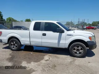 2014 Ford F-150 XL with VIN 1FTEX1CM4EFA59675, listed as a IAAI auction lot 42068873 with 205,342 mi miles. Bid and sale history available at carsss.com. Image 13.