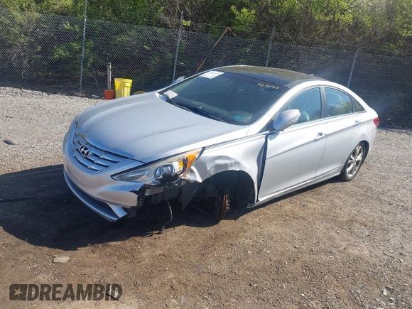 2012 Hyundai Sonata Limited z VIN 5NPEC4AC2CH469899, wystawiony jako IAAI lot #42008219 z przebiegiem 167 679 mil mil oraz . Historia ofert i sprzedaży dostępna na DreamBid. Obrazek 2.