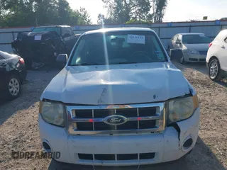2009 Ford Escape XLS with VIN 1FMCU027X9KC79854, listed as a IAAI auction lot 42131142 with Not provided miles and . Bid and sale history available at DreamBid. Image 11.