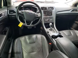 2016 Ford Fusion Titanium Hybrid with VIN 3FA6P0RUXGR204106, listed as a Copart auction lot 62769015 with 106,826 mi miles and Salvage title. Bid and sale history available at DreamBid. Image 8.