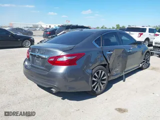2018 Nissan Altima 2.5 SV with VIN 1N4AL3AP1JC102695, listed as a IAAI auction lot 40440992 with 58,063 mi miles. Bid and sale history available at carsss.com. Image 4.