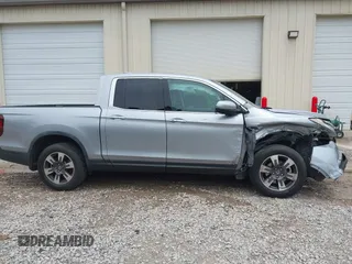 2019 Honda Ridgeline RTL-E with VIN 5FPYK3F75KB019660, listed as a IAAI auction lot 42548495 with 55,969 mi miles and . Bid and sale history available at DreamBid. Image 14.