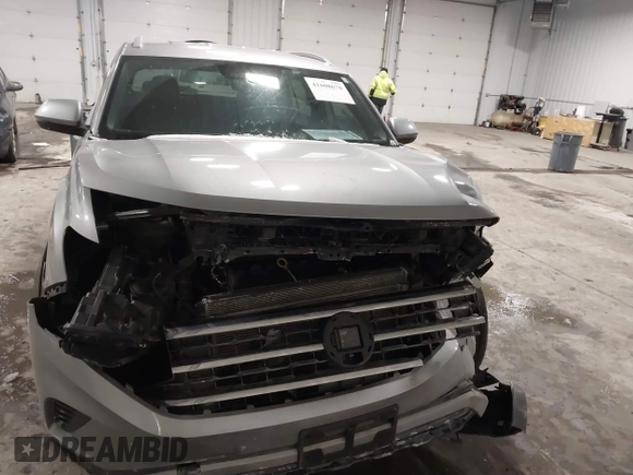 2021 Volkswagen Atlas SE z VIN 1V2HE2CA9MC219076, wystawiony jako IAAI lot #41608670 z przebiegiem 56 162 mil mil oraz . Historia ofert i sprzedaży dostępna na DreamBid. Obrazek 6.