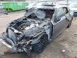 2018 BMW 7 Series 750i with VIN WBA7F0C55JGM23778, listed as a IAAI auction lot 41446517 with 88,498 mi miles. Bid and sale history available at carsss.com. Image 2.