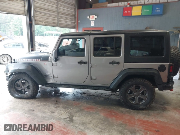 2017 Jeep Wrangler Unlimited Rubicon Recon z VIN 1C4BJWFG5HL687757, wystawiony jako IAAI lot #42367095 z przebiegiem 48 441 mil mil oraz . Historia ofert i sprzedaży dostępna na DreamBid. Obrazek 14.