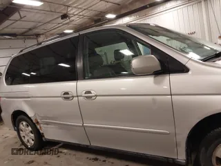 2004 Honda Odyssey EX-L with VIN 5FNRL18974B127696, listed as a IAAI auction lot 41643243 with 200,286 mi miles and . Bid and sale history available at DreamBid. Image 14.