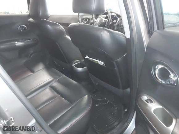 2012 Nissan Juke S with VIN JN8AF5MR8CT115848, listed as a IAAI auction lot 41553459 with 122,189 mi miles. Bid and sale history available at carsss.com. Image 8.