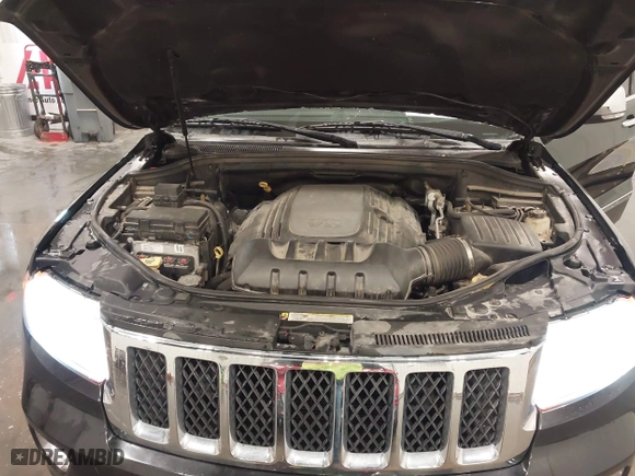 2011 Jeep Grand Cherokee Overland with VIN 1J4RR6GT7BC607735, listed as a IAAI auction lot 41830669 with 98,161 mi miles. Bid and sale history available at carsss.com. Image 10.