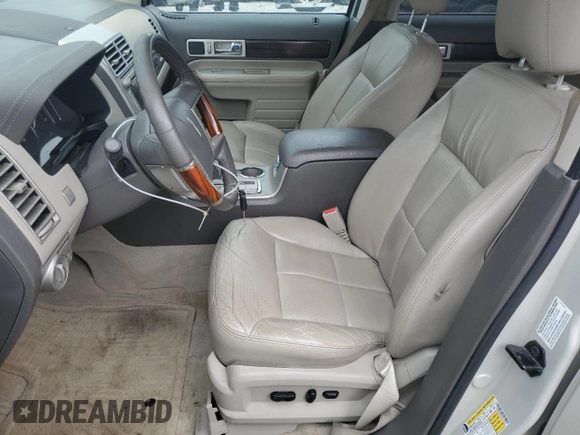 2007 Lincoln MKX z VIN 2LMDU68C97BJ33226, wystawiony jako Copart lot #52607515 z przebiegiem 195 123 mil mil oraz Szkoda całkowita • Salvage title. Historia ofert i sprzedaży dostępna na DreamBid. Obrazek 7.