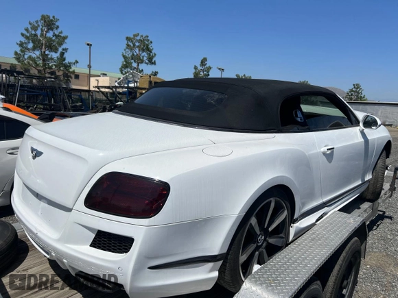 2013 Bentley Continental GT with VIN SCBGT3ZA8DC087043, listed as a Copart auction lot 57523435 with 55,293 mi miles and Clean Title. Bid and sale history available at DreamBid. Image 4.