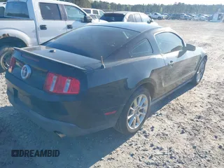 2010 Ford Mustang V6 with VIN 1ZVBP8AN0A5163231, listed as a IAAI auction lot 41876384 with 113,419 mi miles. Bid and sale history available at carsss.com. Image 4.