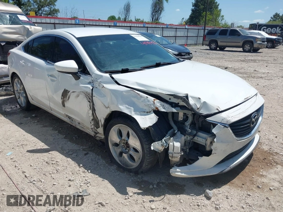 2015 Mazda 6 i Touring with VIN JM1GJ1V55F1209341, listed as a IAAI auction lot 41984500 with 192,140 mi miles. Bid and sale history available at carsss.com. Image 1.