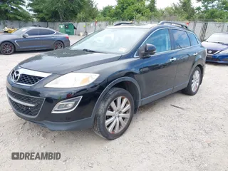 2010 Mazda CX-9 Touring z VIN JM3TB3MV6A0215776, wystawiony jako IAAI lot #42739616 z przebiegiem 215 350 mil mil oraz . Historia ofert i sprzedaży dostępna na DreamBid. Obrazek 2.
