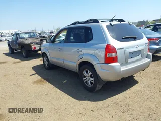 2007 Hyundai Tucson SE with VIN KM8JN12D07U632975, listed as a IAAI auction lot 42099734 with 154,320 mi miles. Bid and sale history available at carsss.com. Image 3.