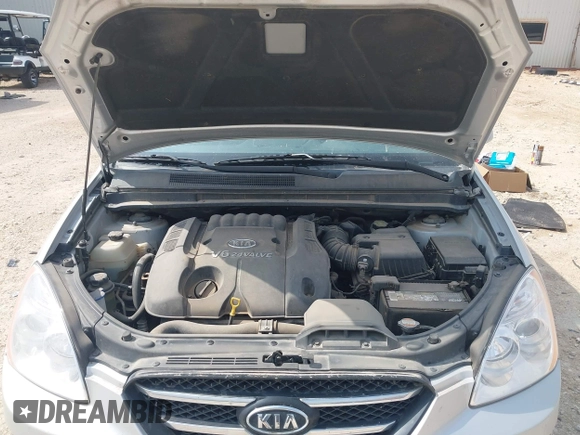 2007 Kia Rondo LX with VIN KNAFG526077069189, listed as a IAAI auction lot 42090474 with 96,722 mi miles. Bid and sale history available at carsss.com. Image 10.