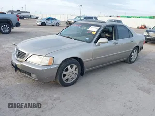 2002 Acura RL z VIN JH4KA96552C008589, wystawiony jako IAAI lot #41860930 z przebiegiem 210 847 mil mil oraz . Historia ofert i sprzedaży dostępna na DreamBid. Obrazek 2.
