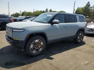 2023 Rivian R1S Launch Edition with VIN 7PDSGABL4PN003782, listed as a Copart auction lot 65851064 with 30,985 mi miles and Salvage Title. Bid and sale history available at carsss.com. Image 1.