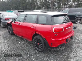 2019 MINI Clubman Cooper S with VIN WMWLU5C52K2G03545, listed as a IAAI auction lot 41279158 with 56,875 mi miles. Bid and sale history available at carsss.com. Image 3.