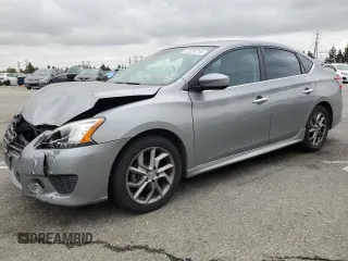 2013 Nissan Sentra SR z VIN 3N1AB7AP0DL563564, wystawiony jako Copart lot #52929715 z przebiegiem 128 945 mil mil oraz Szkody całkowita. Historia ofert i sprzedaży dostępna na DreamBid. Obrazek 1.