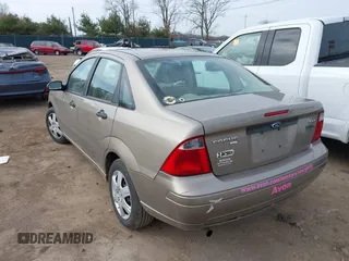 2005 Ford Focus S with VIN 1FAHP34N35W144951, listed as a IAAI auction lot 41880459 with 141,333 mi miles and . Bid and sale history available at carsss.com. Image 3.