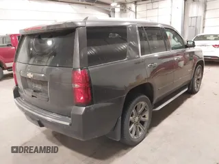 2016 Chevrolet Tahoe LTZ with VIN 1GNSKCKC1GR201155, listed as a IAAI auction lot 42235228 with 184,585 mi miles and . Bid and sale history available at DreamBid. Image 4.