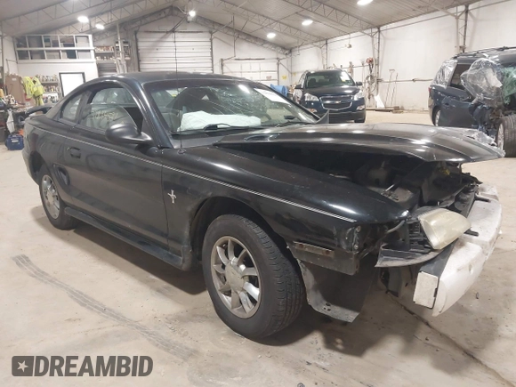 1997 Ford Mustang with VIN 1FALP4041VF157548, listed as a IAAI auction lot 39894591 with 146,891 mi miles. Bid and sale history available at carsss.com. Image 1.