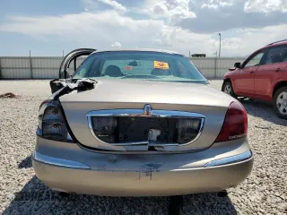 2001 Lincoln Continental with VIN 1LNHM97V21Y698784, listed as a Copart auction lot 64040134 with Not Provided miles and Salvage Title. Bid and sale history available at DreamBid. Image 6.