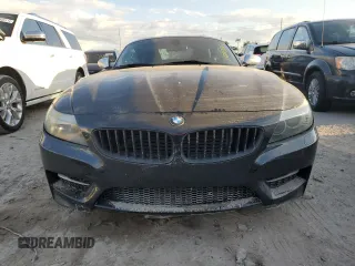 2011 BMW Z4 sDrive35is with VIN WBALM1C56BE633331, listed as a Copart auction lot 73922324 with 0 mi miles and Salvage Title. Bid and sale history available at carsss.com. Image 5.