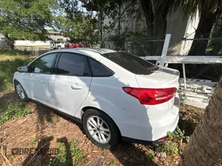 2015 Ford Focus SE with VIN 1FADP3F21FL338821, listed as a Copart auction lot 54631415 with 84,648 mi miles and Salvage Title. Bid and sale history available at carsss.com. Image 3.