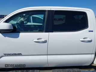 2018 Toyota Tacoma SR5 with VIN 5TFAZ5CN4JX056465, listed as a IAAI auction lot 41767848 with 71,532 mi miles and . Bid and sale history available at DreamBid. Image 15.