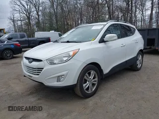 2013 Hyundai Tucson GLS with VIN KM8JU3AC5DU693550, listed as a IAAI auction lot 41919615 with 202,517 mi miles. Bid and sale history available at carsss.com. Image 17.