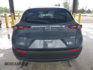 2023 Mazda CX-30 S Carbon Edition with VIN 3MVDMBCM1PM558865, listed as a IAAI auction lot 42298416 with 19,276 mi miles and . Bid and sale history available at DreamBid. Image 17.