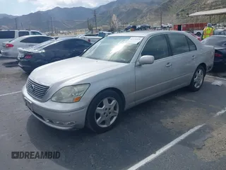 2004 Lexus LS 430 z VIN JTHBN36F140172016, wystawiony jako IAAI lot #42128428 z przebiegiem 242 204 mil mil oraz . Historia ofert i sprzedaży dostępna na DreamBid. Obrazek 2.