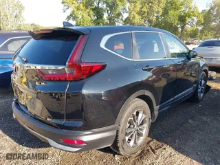 2021 Honda CR-V EX-L with VIN 7FARW1H87ME013135, listed as a IAAI auction lot 40090612 with 69,105 mi miles. Bid and sale history available at carsss.com. Image 4.