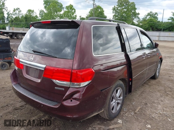 2009 Honda Odyssey Touring with VIN 5FNRL38929B037150, listed as a IAAI auction lot 42319657 with 183,663 mi miles and . Bid and sale history available at DreamBid. Image 4.